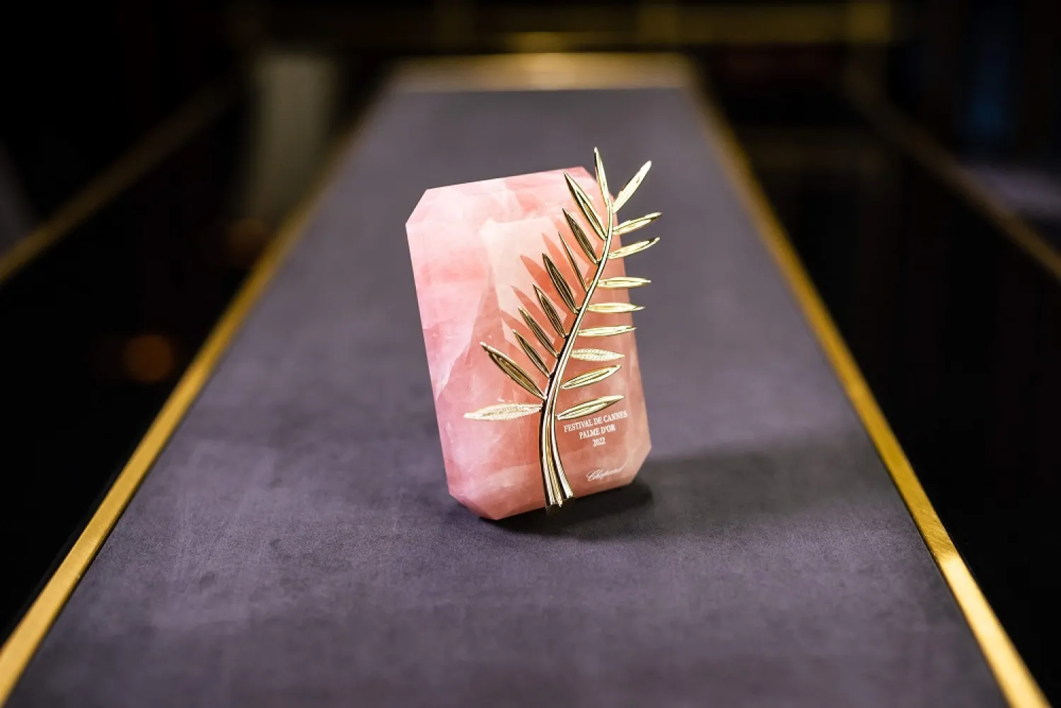 The Palme d'Or trophy is pictured at Chopard Jewellery House on May 10, 2022 in Meyrin near Geneva ahead of the 75th Cannes Film Festival starting May 17 to 28, 2022. (AFP)