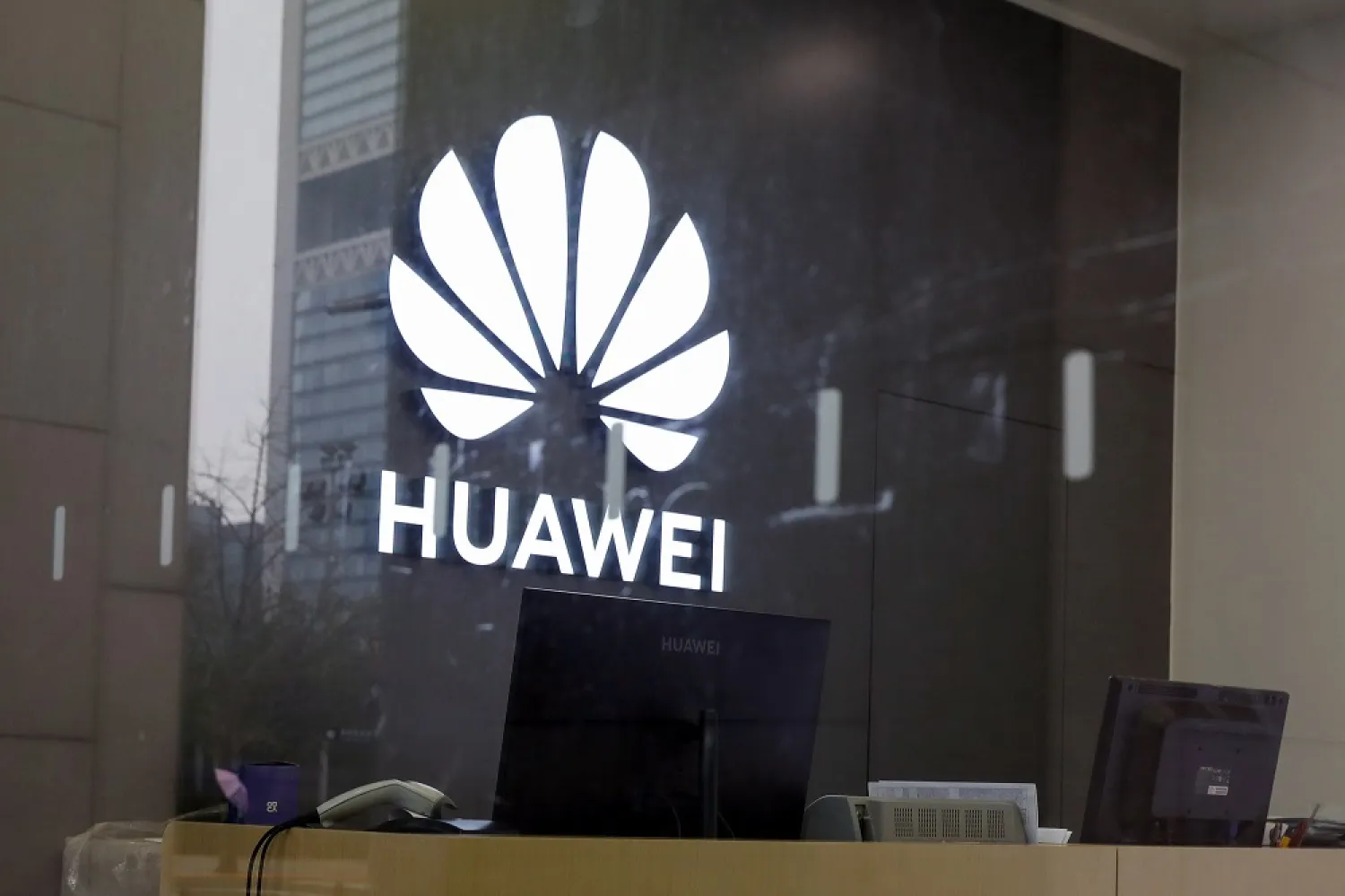 A view of the Huawei logo inside a store in Beijing, China, 29 March 2022.(EPA)