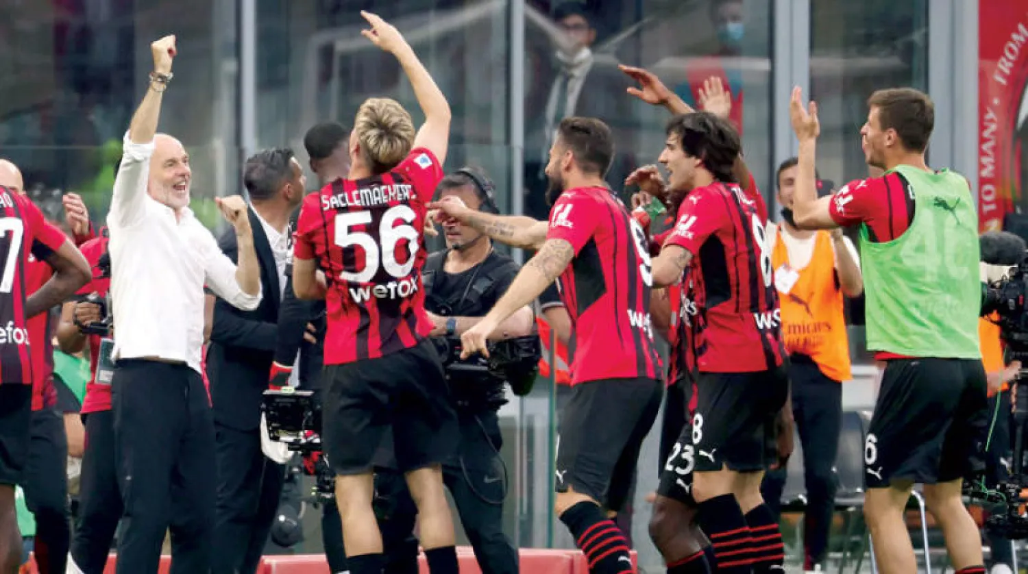 لاعبو ميلان ومدربهم بيولي واثقون من حصد اللقب (إ.ب.أ)