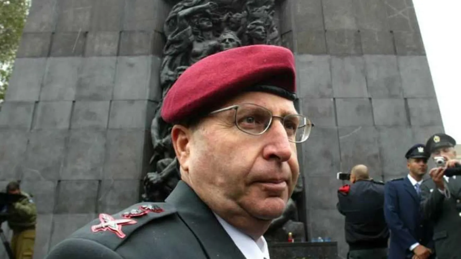 Moshe Ya'alon, then-chief of staff of the Israeli army, stands in front of the Warsaw Ghetto monument, May 18, 2005. (Reuters)