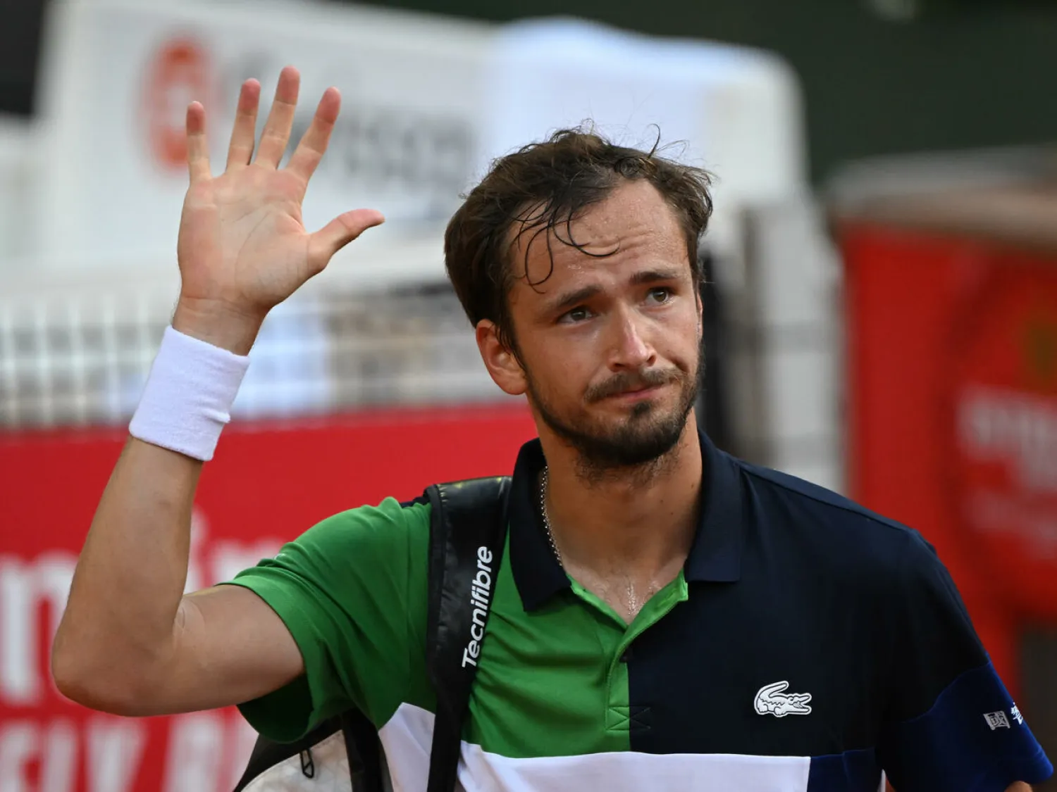 See you! Daniil Medvedev waves as he leaves the court after being defeated by Richard Gasquet in Geneva last week Fabrice COFFRINI AFP
