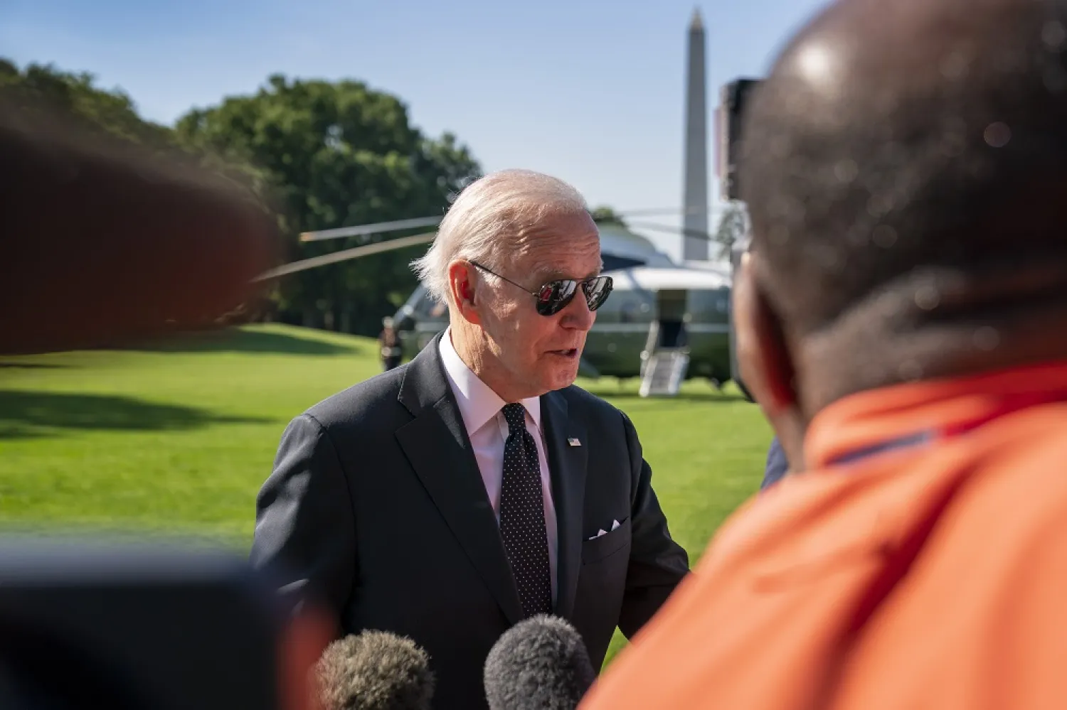 President Joe Biden speaks to members of the media on the South Lawn of the White House in Washington, Monday, May 30, 2022, after returning from Wilmington, Del. (AP)