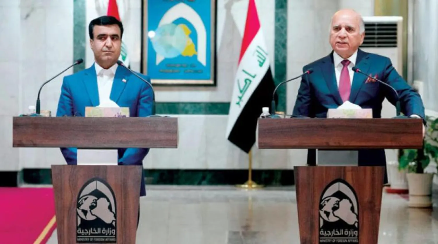 Iraqi Foreign Minister Fuad Hussein during a press conference with Iranian Vice President and Head of the Environmental Protection Organization Ali Salajegheh (AP)