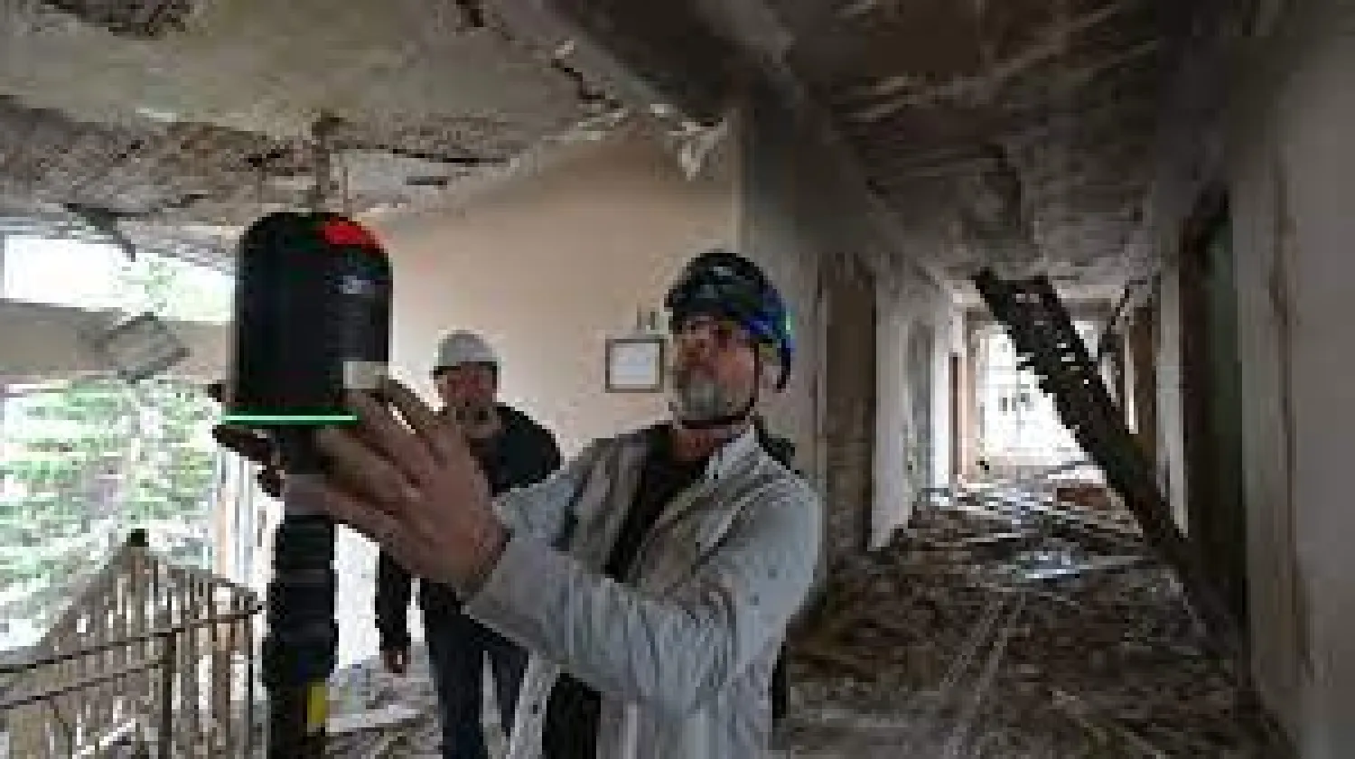 Durand's 3D laser scanner creates a minutely detailed reconstruction of Kharkiv's historic fire station Genya SAVILOV AFP
