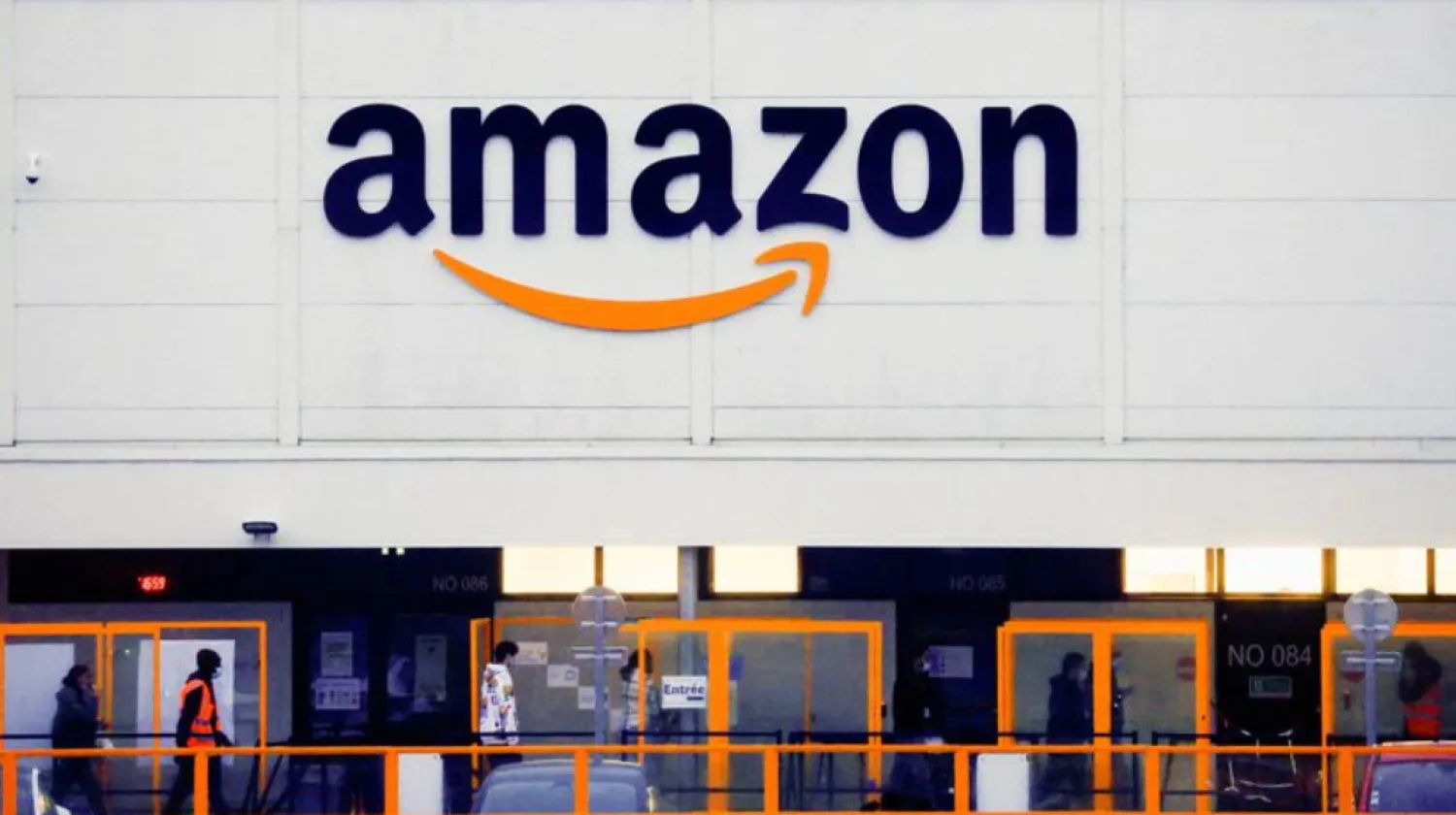 The logo of Amazon is seen at the company's logistics center in Bretigny-sur-Orge, near Paris, France, December 7, 2021. REUTERS/Gonzalo Fuentes