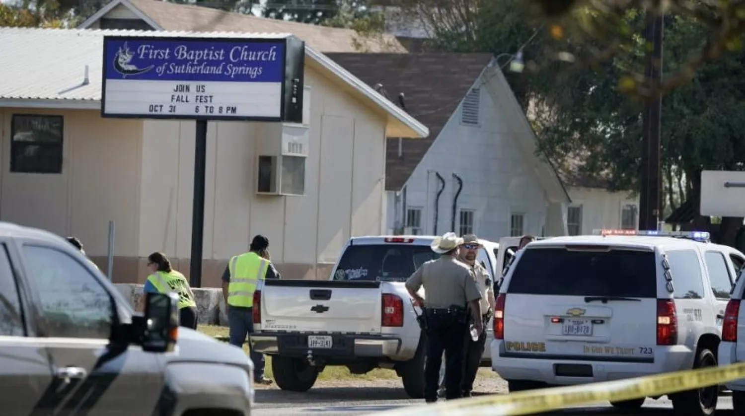 File Photo: Law enforcement officers gather in front of the First Baptist Church of Sutherland Springs after the fatal shooting. Darren Abate/AP Photo
