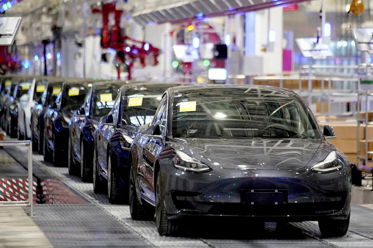 Tesla China-made Model 3 vehicles are seen during a delivery event at the carmaker's factory in Shanghai, China January 7, 2020. (Reuters)
