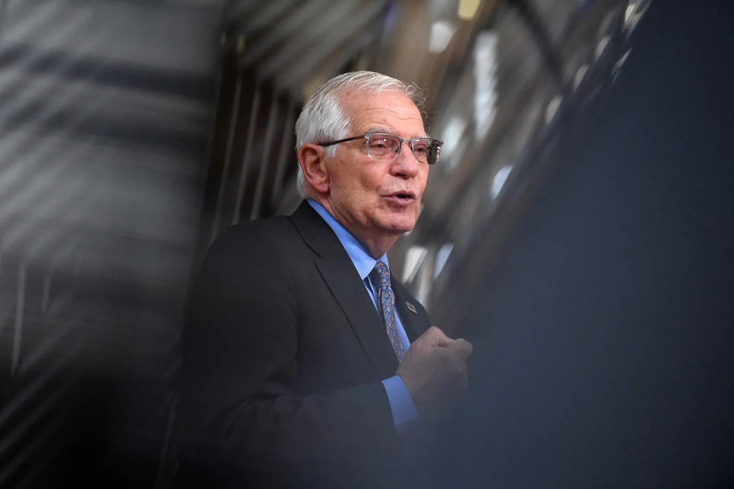 EU High Representative of the Union for Foreign Affairs and Security Policy Josep Borrell talks to the press as he arrives for the first day of a special meeting of the European Council at The European Council Building in Brussels on May 30, 2022. (AFP) 