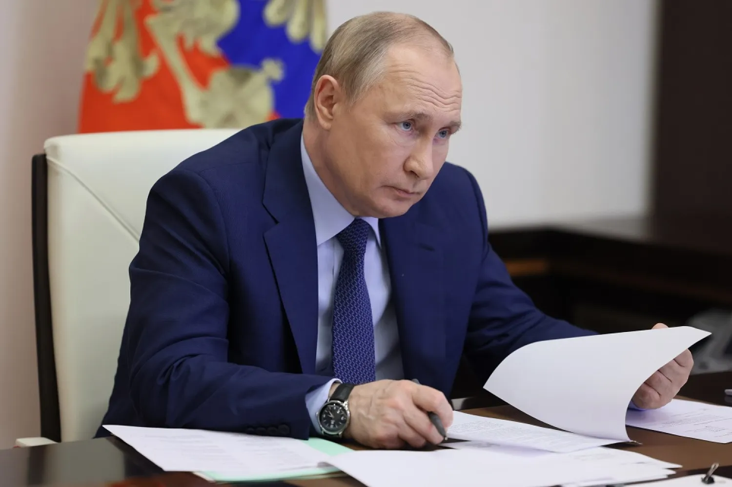 Russian President Vladimir Putin attends a meeting on the road construction development via videoconference at the Novo-Ogaryovo residence outside Moscow, Russia, Thursday, June 2, 2022. (Sputnik, Kremlin Pool Photo via AP) 