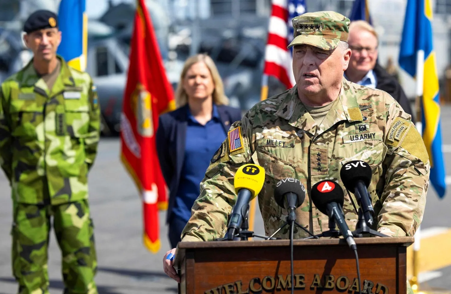 US Chairman of the Joint Chiefs of Staff, General Mark Milley speaks during a press conference, also attended by (L-R) Swedish Supreme Commander Micael Byd駭, Swedish Prime Minister Magdalena Andersson and Swedish De-fence Minister Peter Hultqvist, aboard the American amphibious warship USS Kearsarge in Stockholm, Sweden, on June 4, 2022. (Photo by Fredrik PERSSON / TT NEWS AGENCY / AFP) /