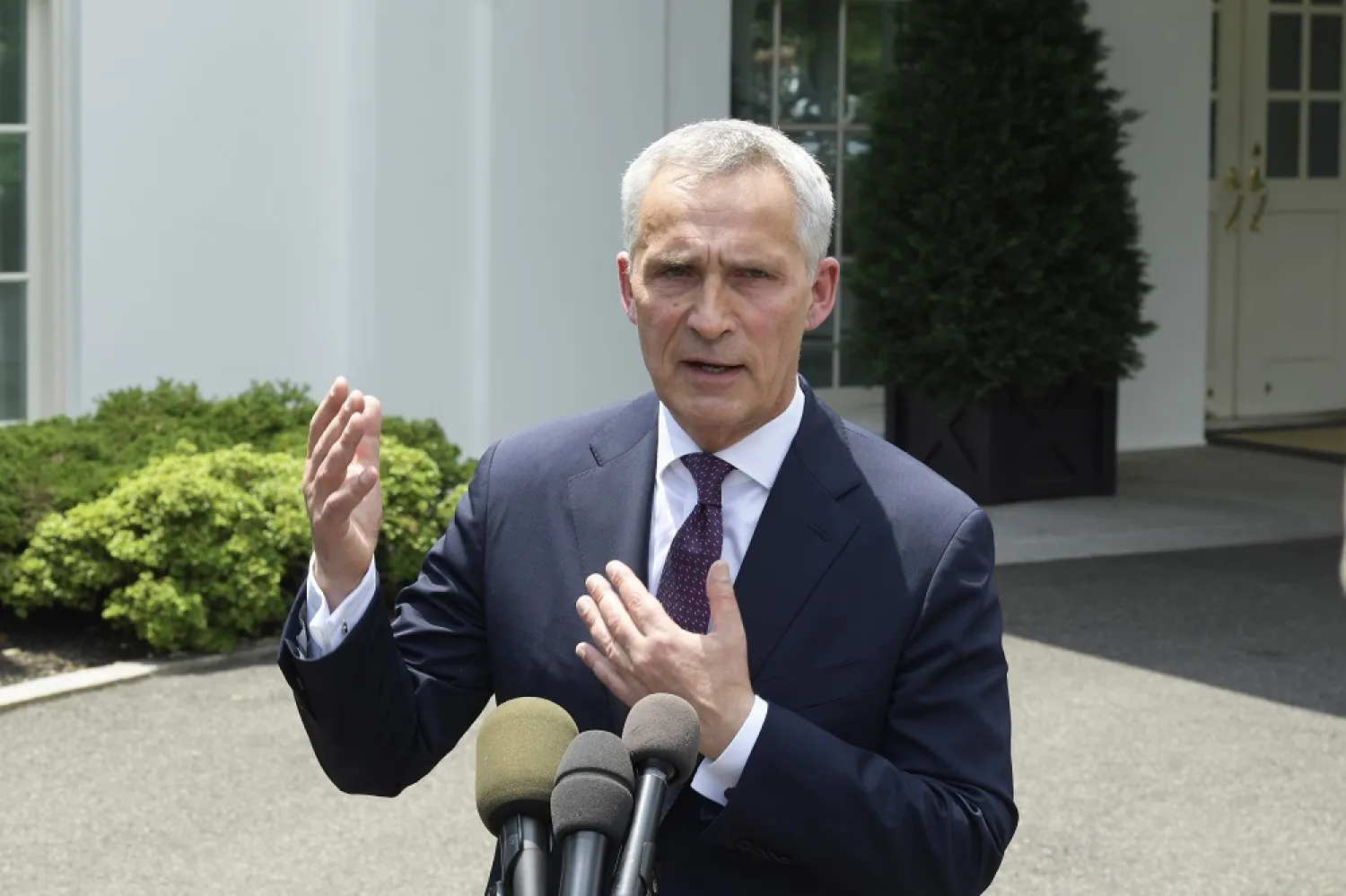 02 June 2022, US, Washington: NATO Secretary General Jens Stoltenberg speaks during a press conference at Stakeout location/White House in Washington. (dpa)