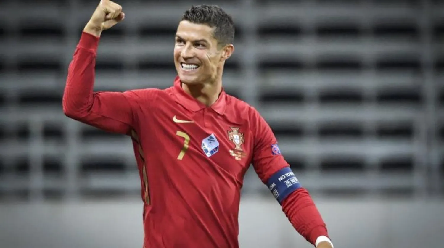 FILE: Portugal's Ronaldo celebrates after scoring against Sweden, his 100th goal, during the UEFA Nations League Group stage soccer match at Friends Arena in Stockholm, Sweden, Tuesday Sept. 8, 2020. (Janerik Henriksson / TT via AP)

