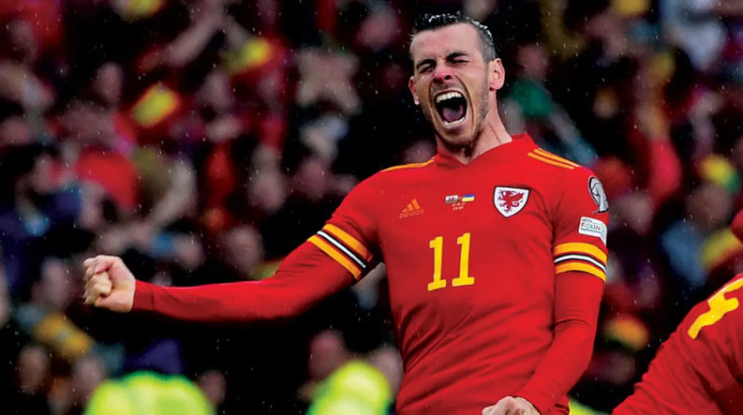 بيل قائد ويلز وفرحة لا توصف بالتأهل للمونديال (رويترز)