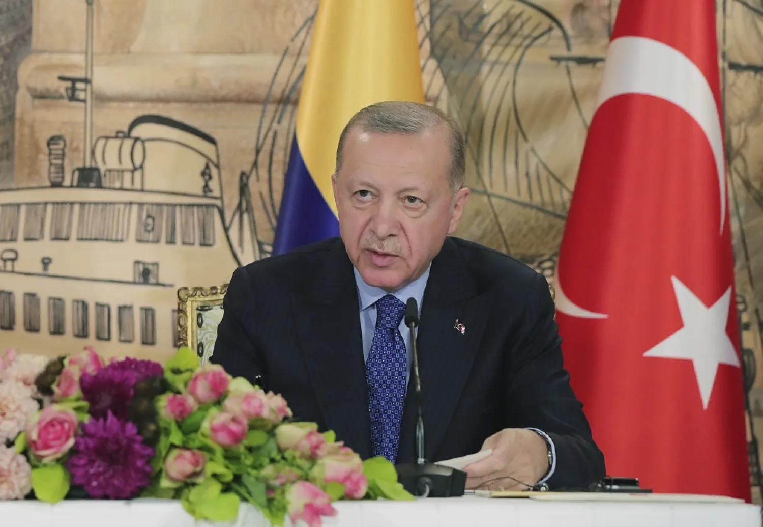 In this photo made available by the Turkish Presidency, Turkish President Recep Tayyip Erdogan speaks during a news conference in Istanbul, Turkey, Friday, May 20, 2022. (Turkish Presidency via AP) 