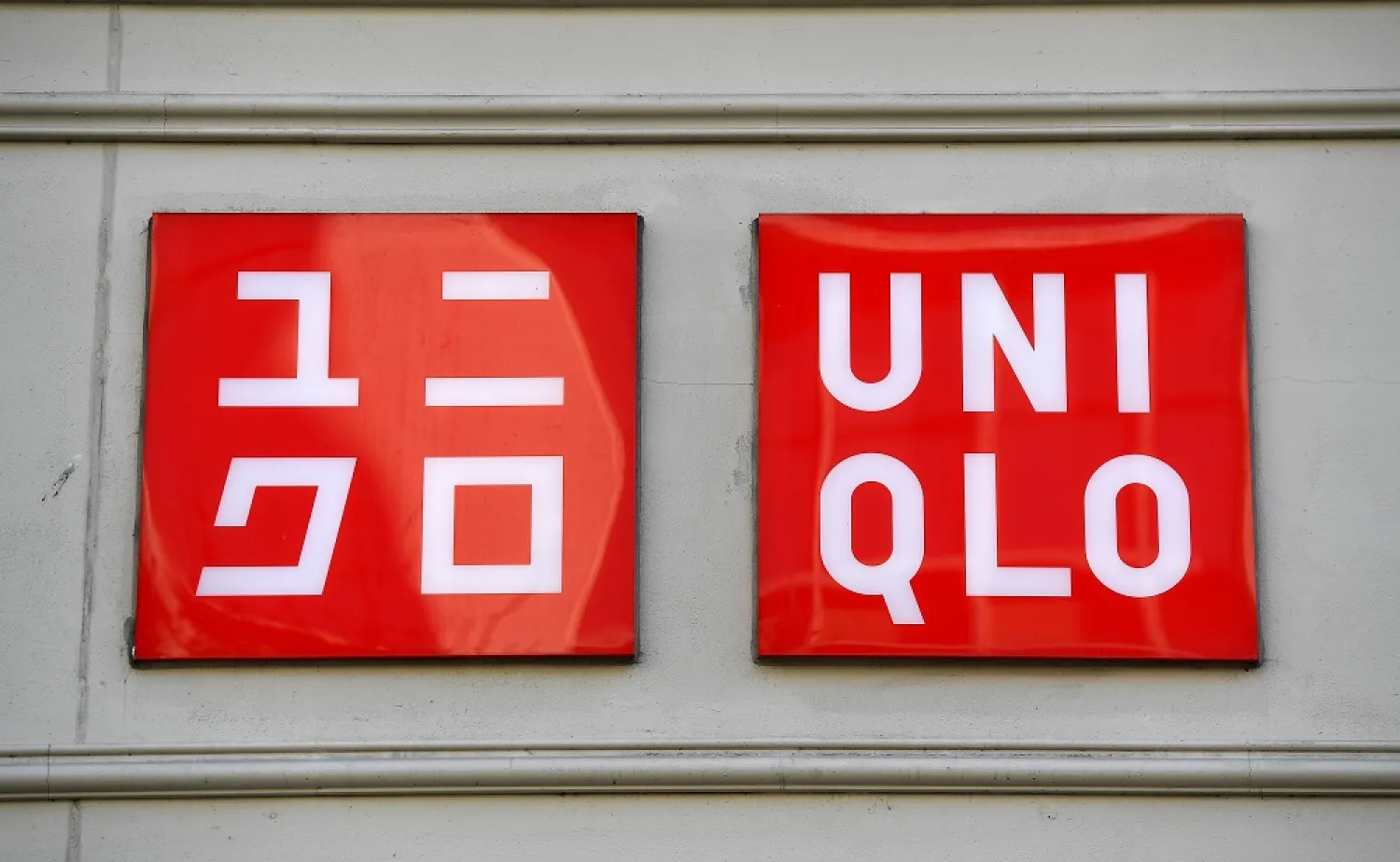 A Uniqlo sign outside a store in London, Britain, 10 March 2022. (EPA)