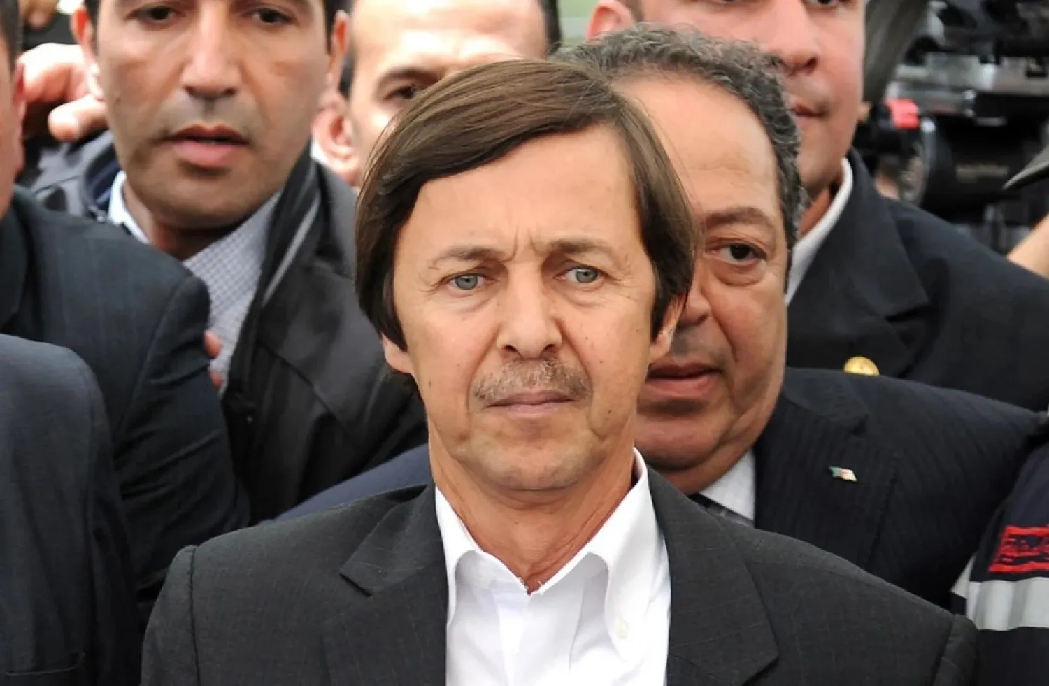 Said Bouteflika, the brother of the former Algerian President, attends the funeral of late Algerian singer Warda Al-Jazairia on 19 May 2012. (AFP)