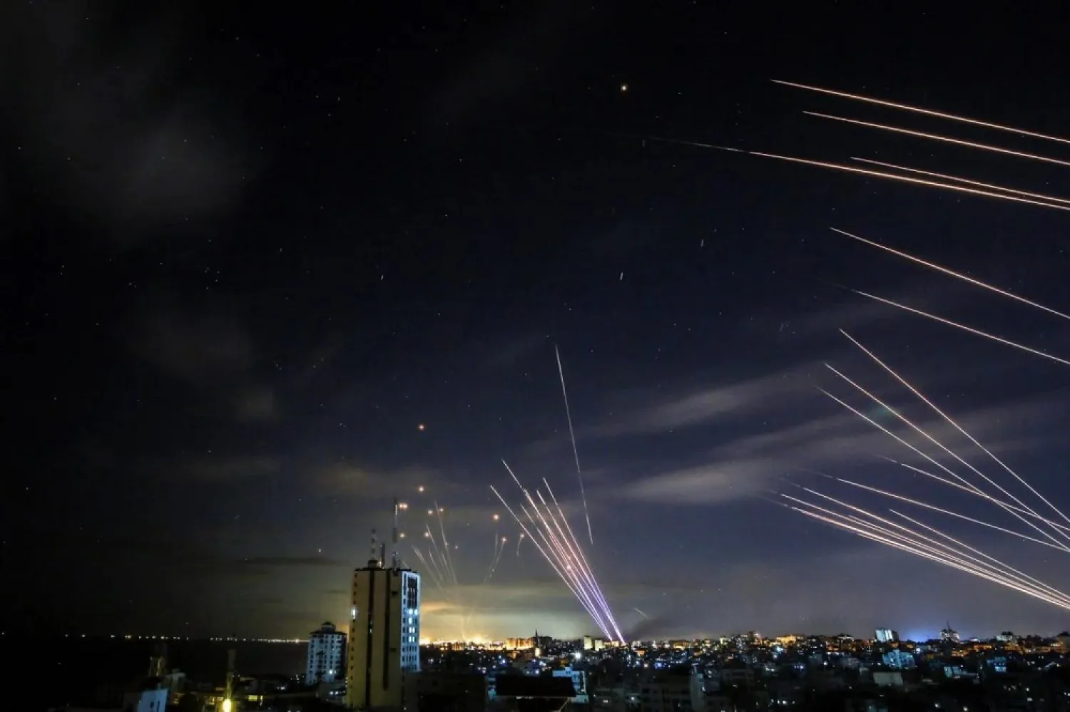 Israeli Iron Dome systems intercept rockets fired by Palestinian armed groups in Gaza on May 16, 2021. (AFP)