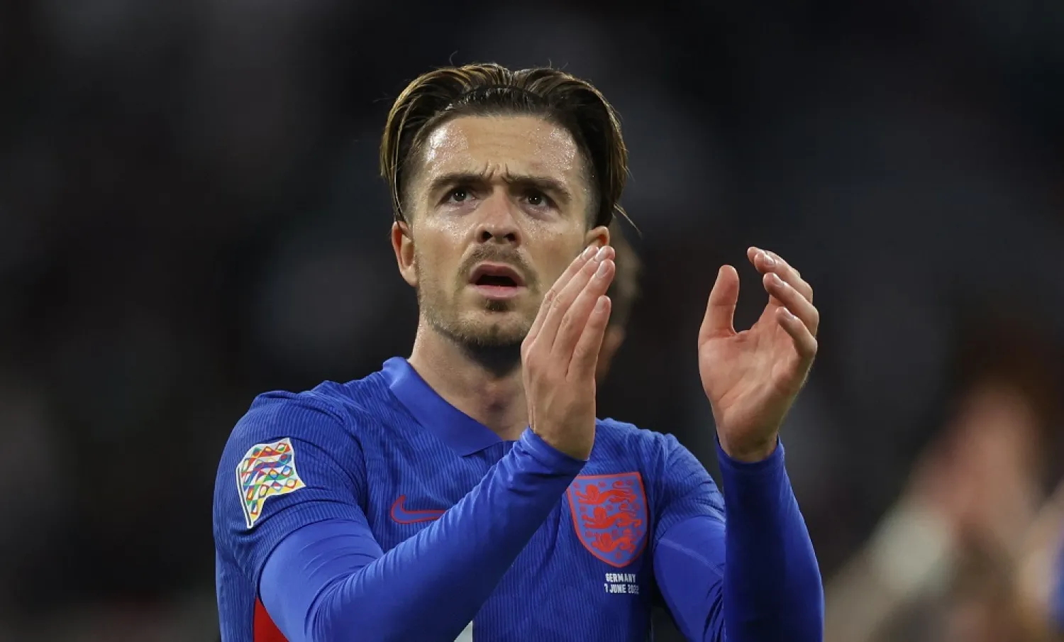 Football - UEFA Nations League - Group C - Germany v England - Allianz Arena, Munich, Germany - June 7, 2022 England's Jack Grealish applauds fans after the match. (Reuters)