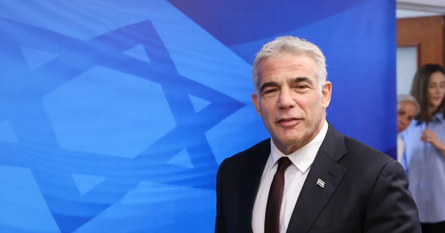 Israeli Foreign Minister Yair Lapid (Emmanuel Dunand/Pool via REUTERS) 
