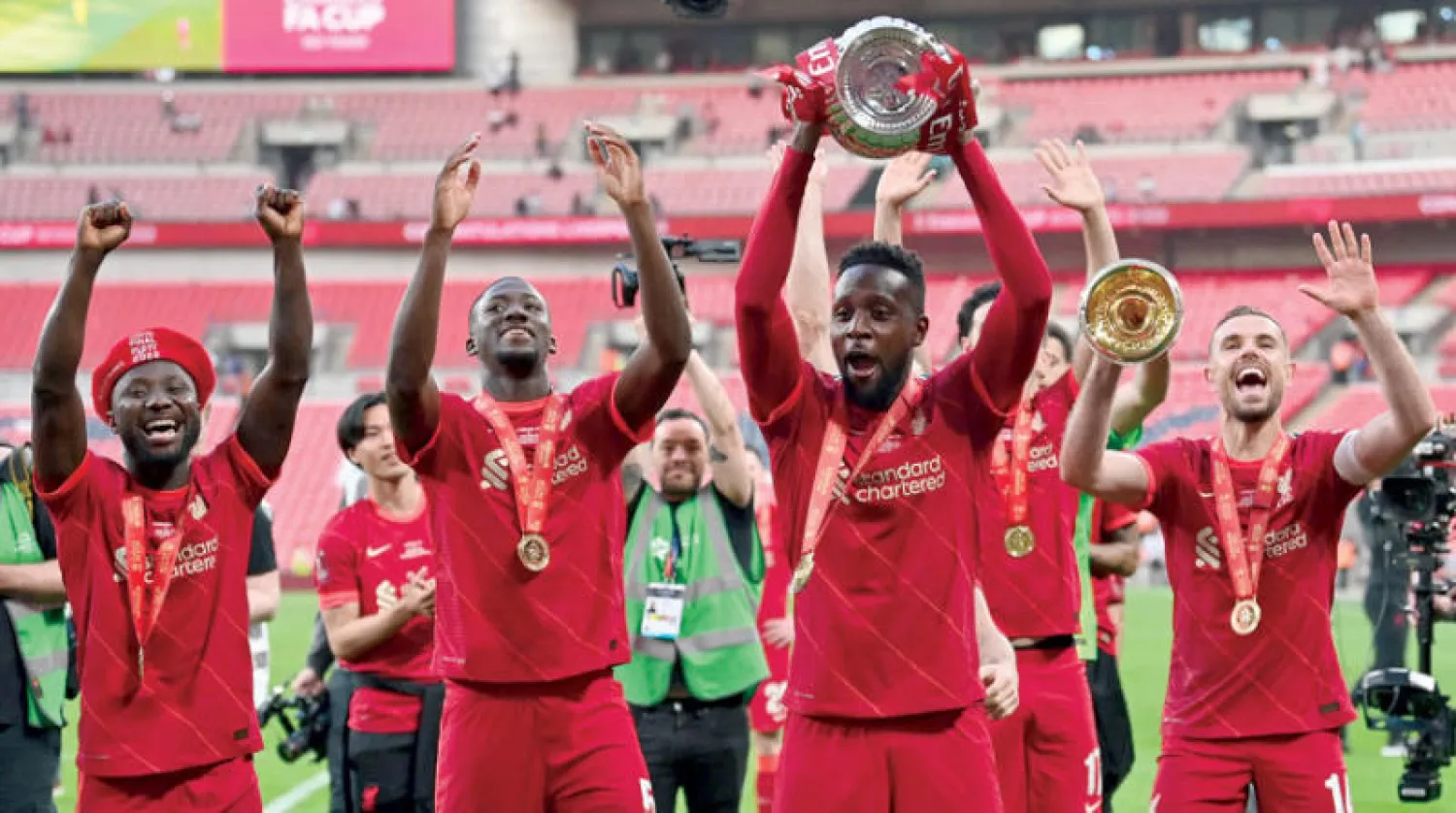 أوريغي يحتفل بكأس إنجلترا في آخر ظهور مع ليفربول (أ.ف.ب)