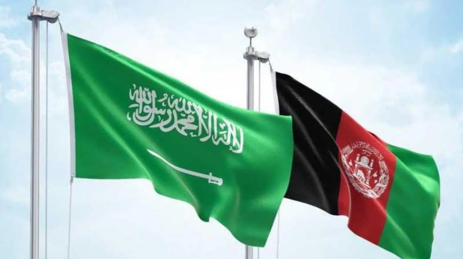 The Saudi and Afghan flags. Asharq Al-Awsat