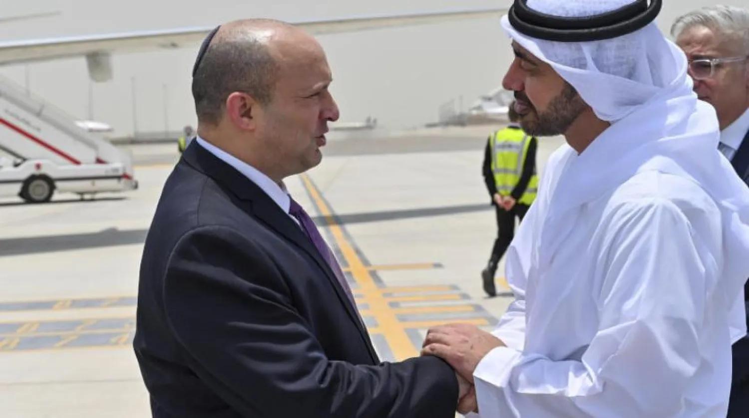 President of the United Arab Emirates Sheikh Mohamed bin Zayed greets Israeli Prime Minister Naftali Bennett on his arrival to Abu Dhabi, United Arab Emirates, Thursday, June 9, 2022. (Israeli Government Press Office via AP)