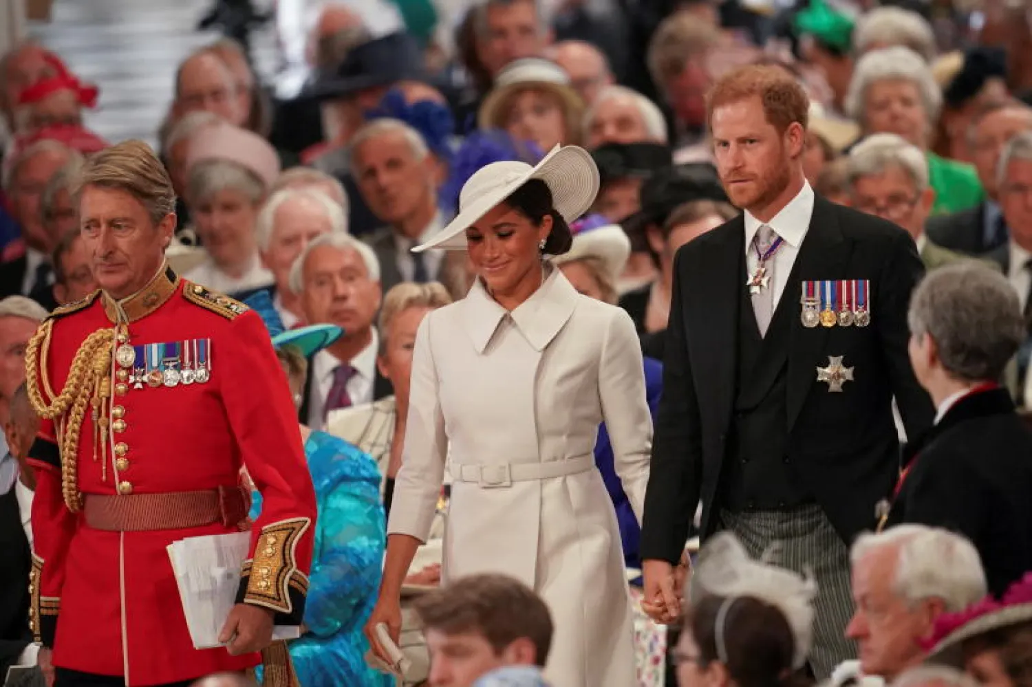 الأمير البريطاني هاري وزوجته ميغان ماركل يحضران احتفالاً يرتبط بيوبيل الملكة البلاتيني في لندن (رويترز)