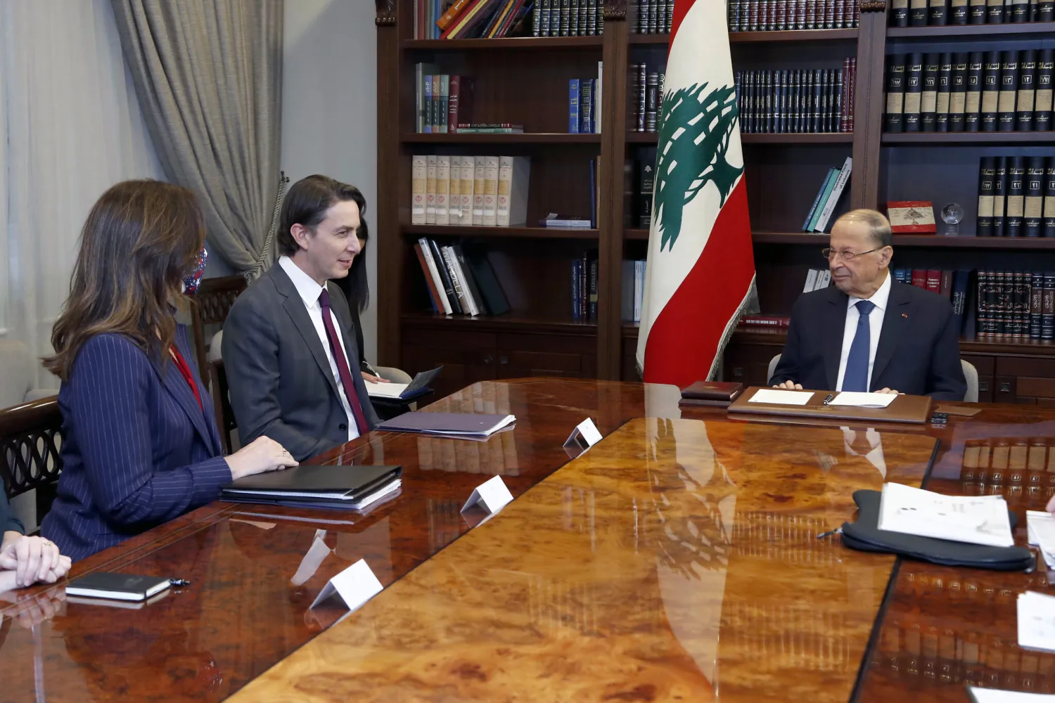 In this photo released by the Lebanese government, Lebanese President Michel Aoun, right, meets with US Envoy for Energy Affairs Amos Hochstein, center, and US Ambassador to Lebanon Dorothy Shea, left, at the presidential palace in Baabda, east of Beirut, Lebanon, February 9, 2022. (Dalati Nohra/Lebanese Official Government via AP)