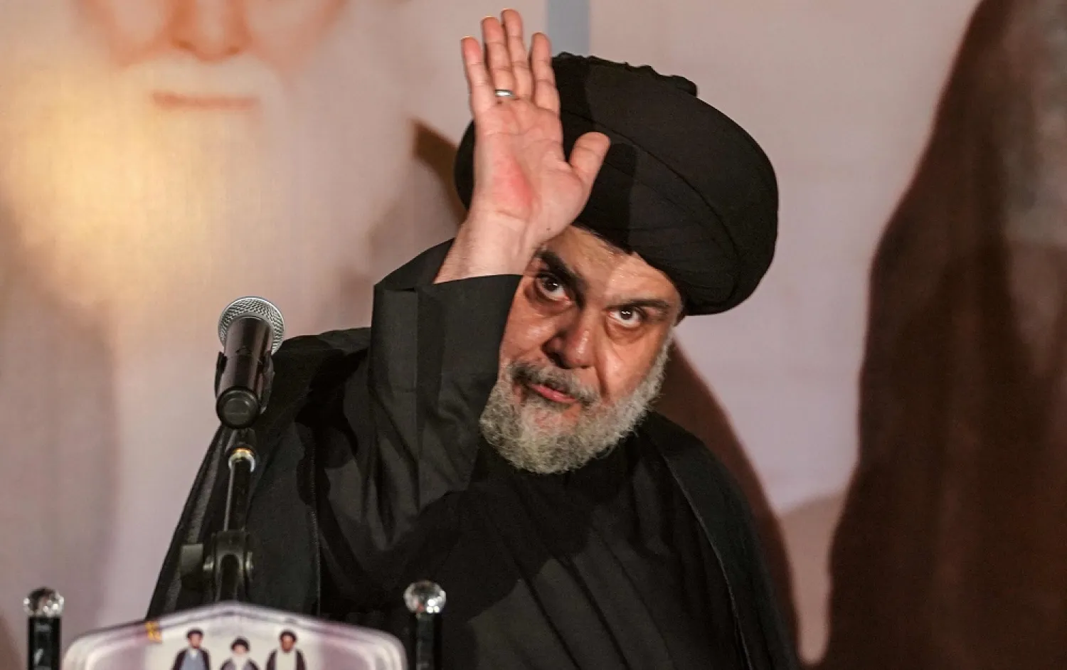 Iraqi Shiite cleric Moqtada al-Sadr at the end of a speech in the southern Iraqi city of Najaf on June 3, 2022. (AFP) 