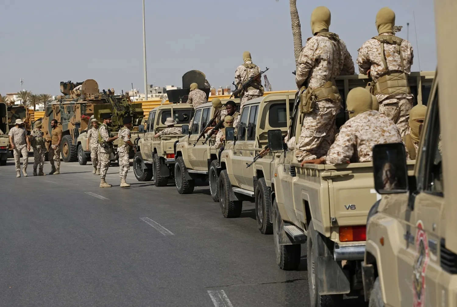 Forces loyal to Abdul Hamid Dbeibah, one of Libya's two rival prime ministers, secure the streets of the capital, Tripoli, on May, 17, 2022. (AP)