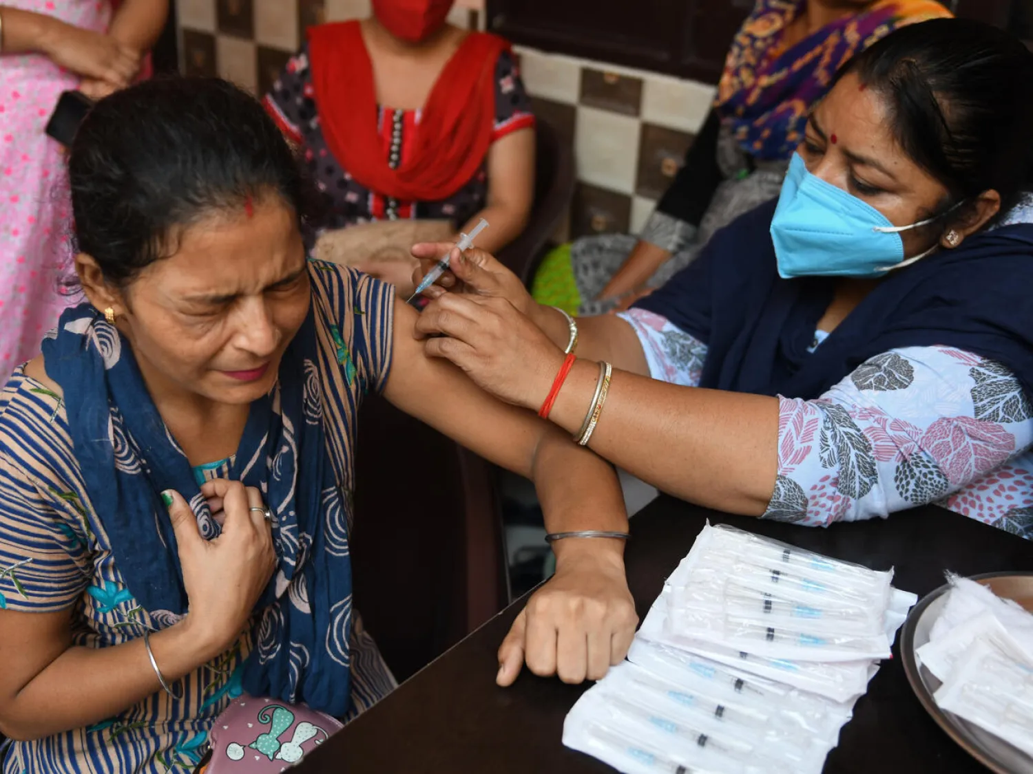 The World Trade Organization's first ministerial meeting since December 2017 is wrestling with the wording of a text that would temporarily waive patents on coronavirus jabs Narinder NANU AFP/File
