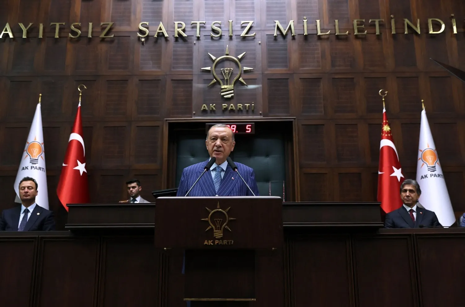 Turkish President and leader of the Justice and Development Party (AK Party) Recep Tayyip Erdogan delivers a speech during his party's parliamentary group meeting at the Turkish Grand National Assembly in Ankara on June 15, 2022. (AFP)