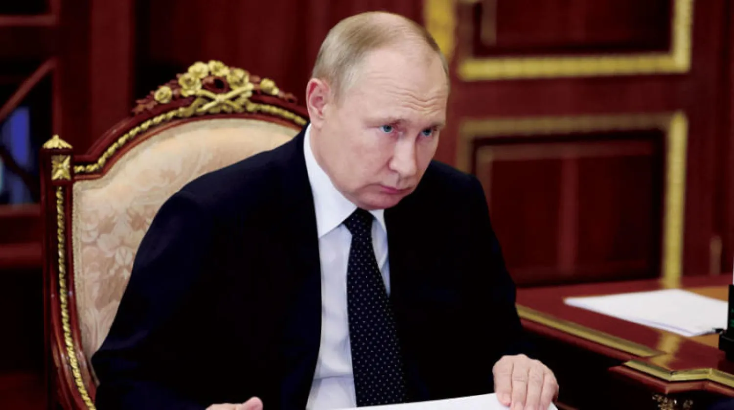 بوتين لدى حضوره اجتماعاً في موسكو في 15 يونيو (أ.ف.ب)