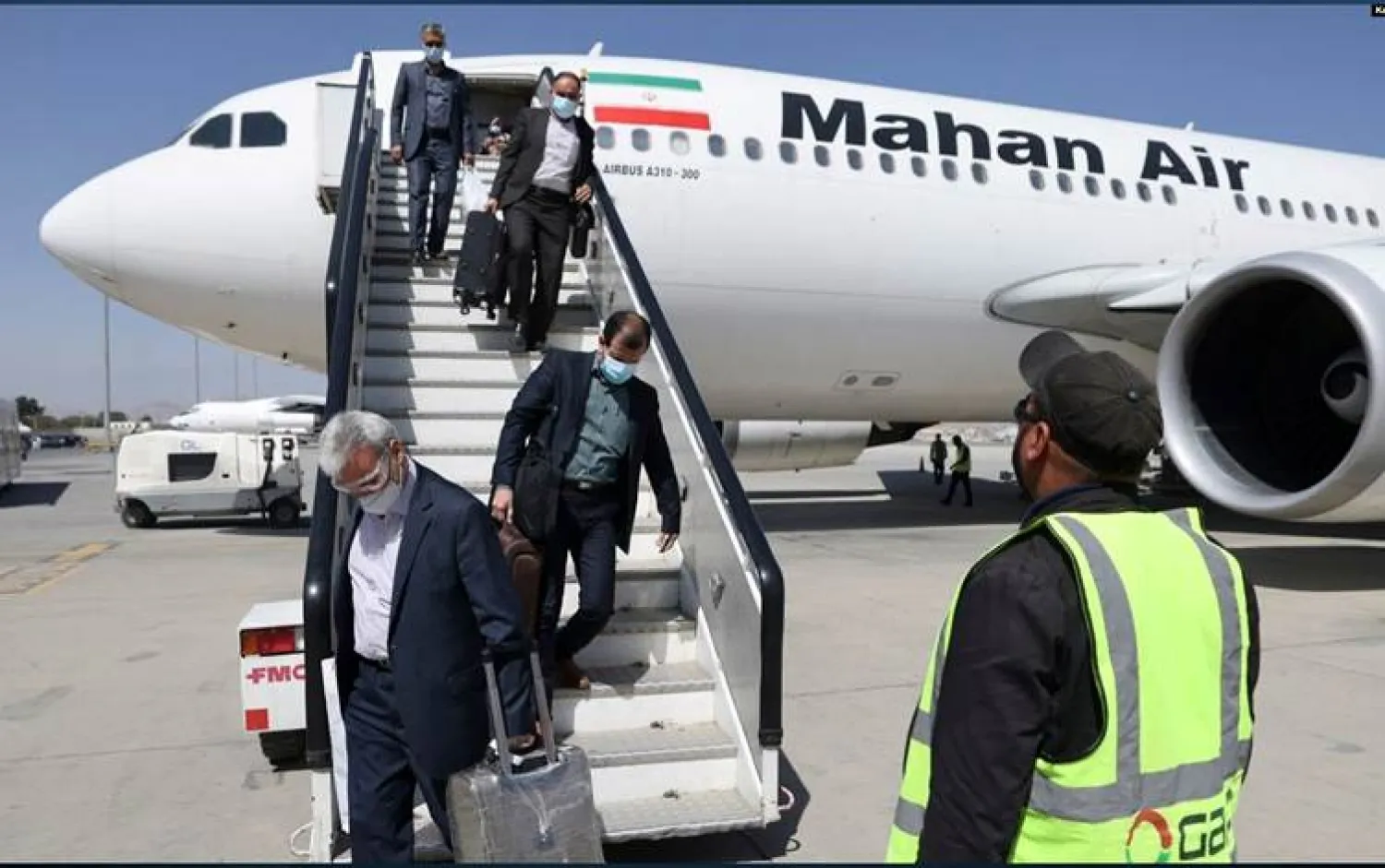 Passengers get off a Mahan Air aircraft at Kabul airport on September 15, 2021. File photo: AFP.