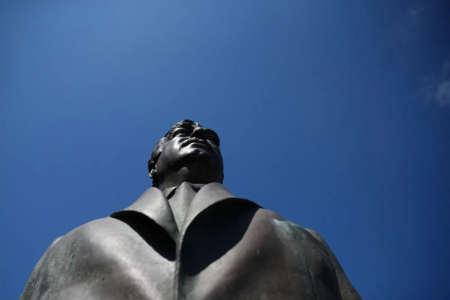 A statue of Lebanon's assassinated former Prime Minister Rafik al-Hariri is seen near the site of the suicide truck bombing that killed him in 2005, in Beirut, Lebanon, August 18, 2020. (Reuters)
