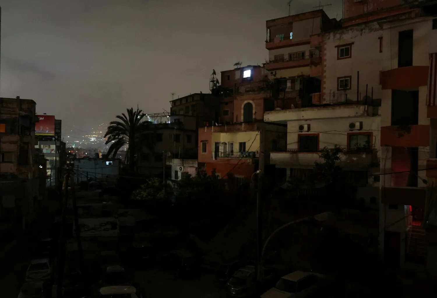 Residential buildings are pictured at night during a power cut in Beirut, Lebanon April 27, 2022. (Reuters)