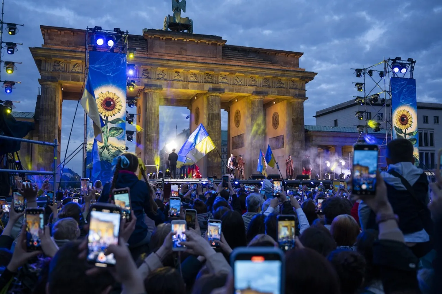 29 May 2022, Berlin: Kalush Orchestra Band, winners of the Eurovision Song Contest 2022, stands on stage at the charity event "Save Ukraine - #StopWar" at the Brandenburg Gate. (dpa)