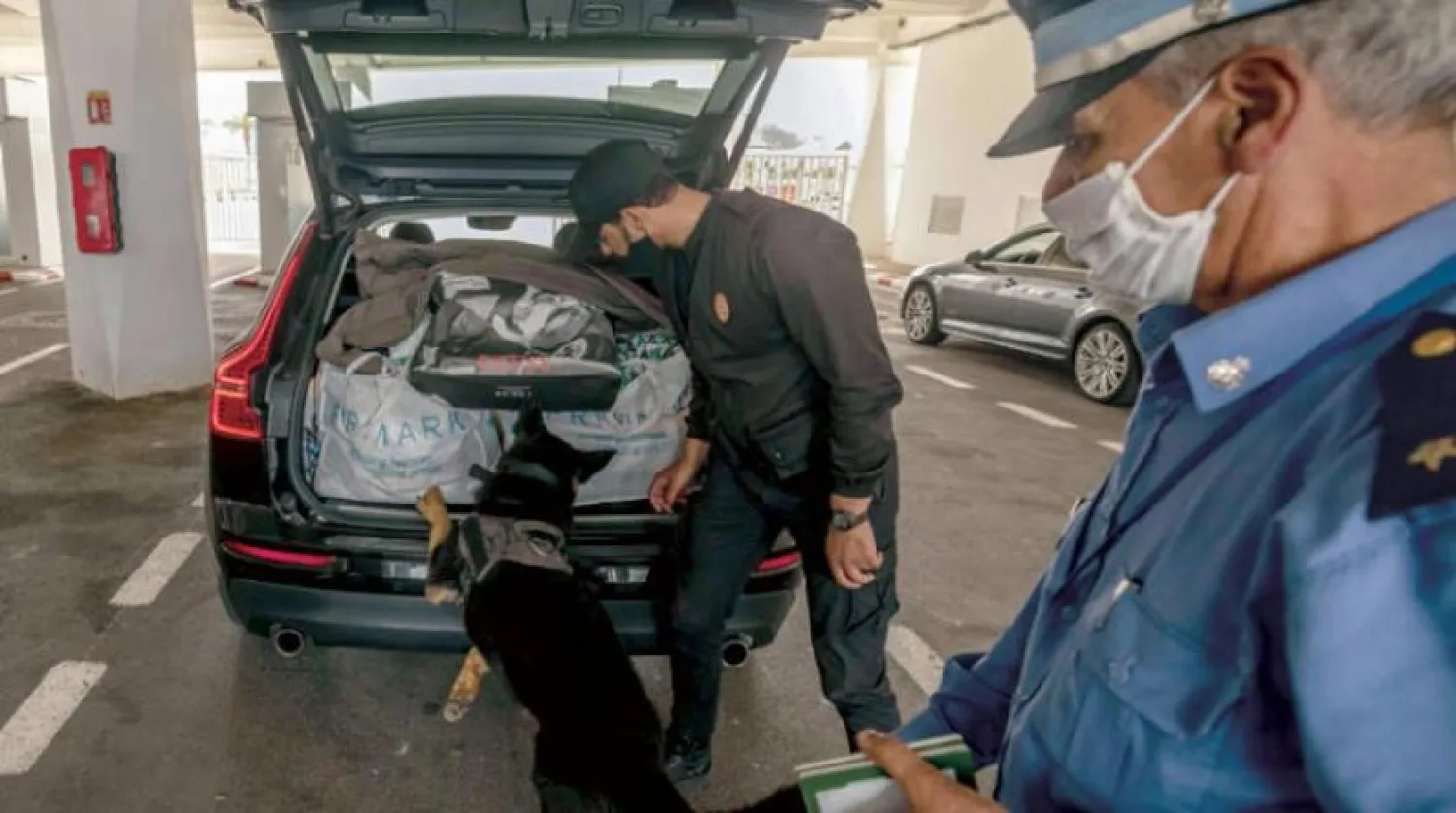 Members of the Moroccan police inspect vehicles as part of efforts to combat terrorism. (AFP) 