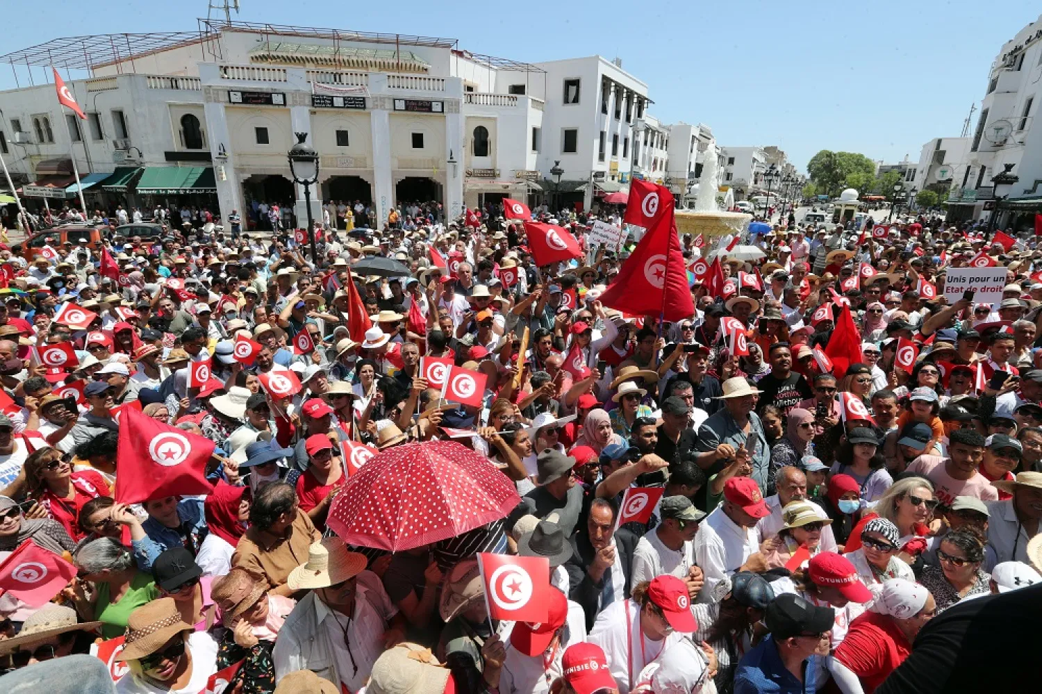 Supporters of Tunisia's Free Destourian Party shout slogans during a demonstration against Tunisian President Kais Saied and against the holding of the referendum of 25 July 2022, in Tunis, Tunisia, 18 June 2022. (EPA)