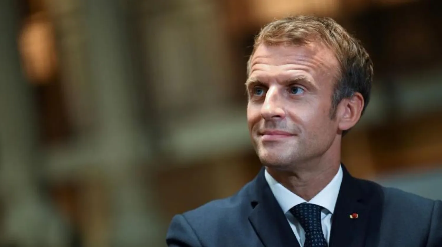 French President Emmanuel Macron looks on as he visits the Richelieu site of the Bibliotheque Nationale de France (National Library of France), after the completion of the renovation project and the 300th anniversary of the installation of the royal collections, in Paris, France, September 28, 2021. (Reuters)
