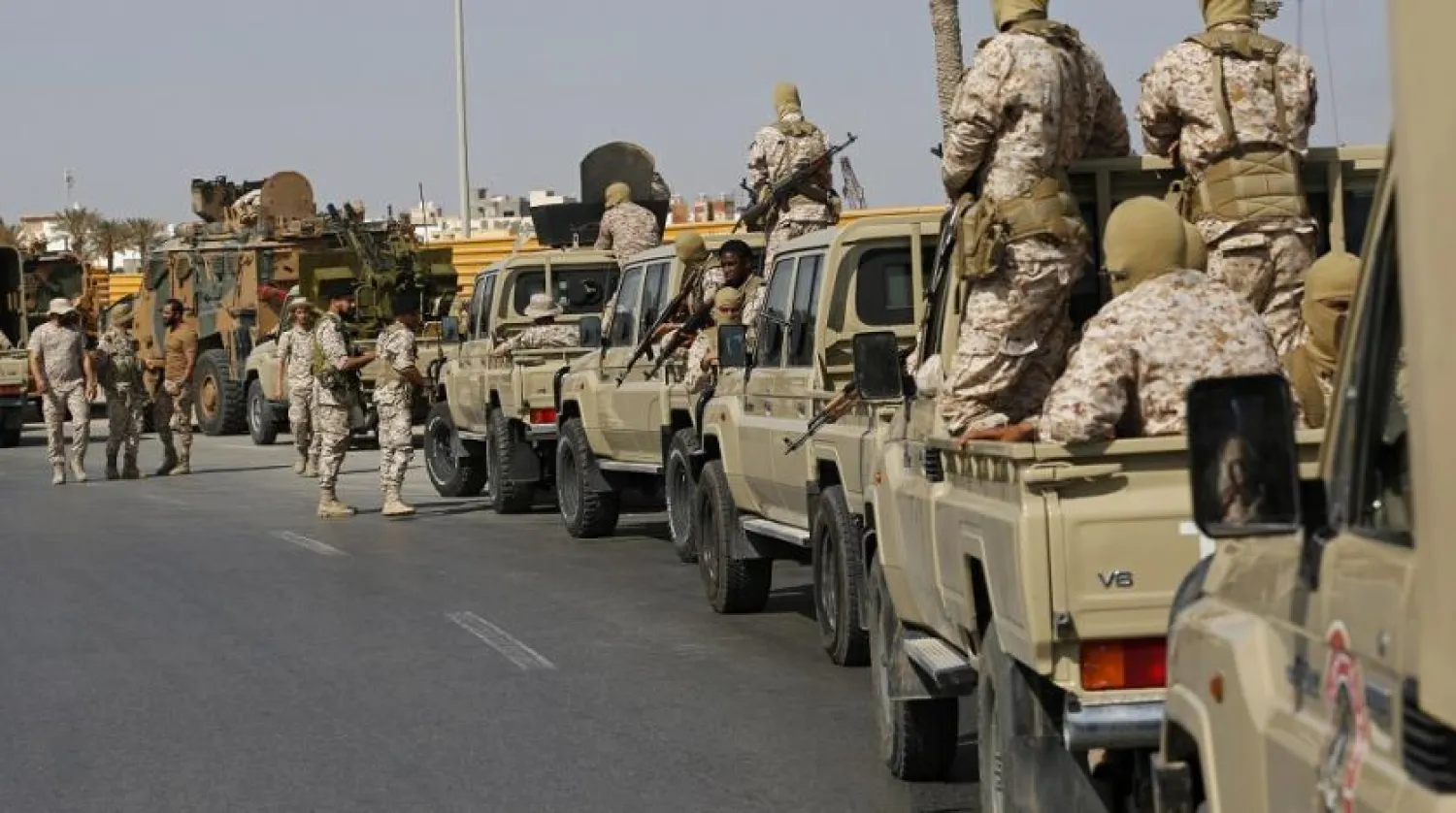 Forces loyal to Abdul Hamid Dbeibah, one of Libya's two rival prime ministers, secure the streets of the capital, Tripoli, on May, 17, 2022. (AP)
