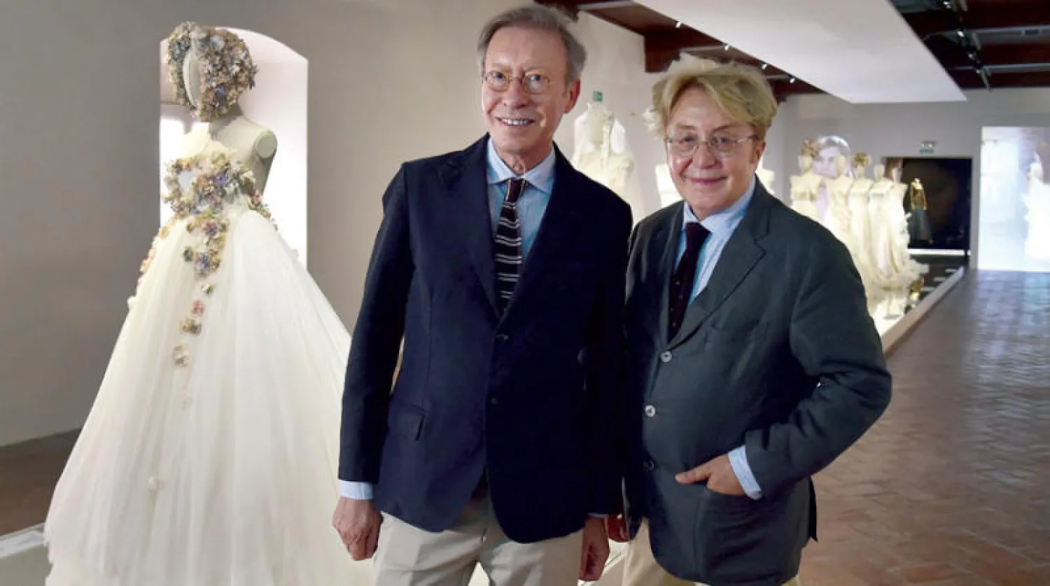 مصمما الأزياء فيكتوريو ولوكينو خلال افتتاح المتحف (أ.ف.ب)