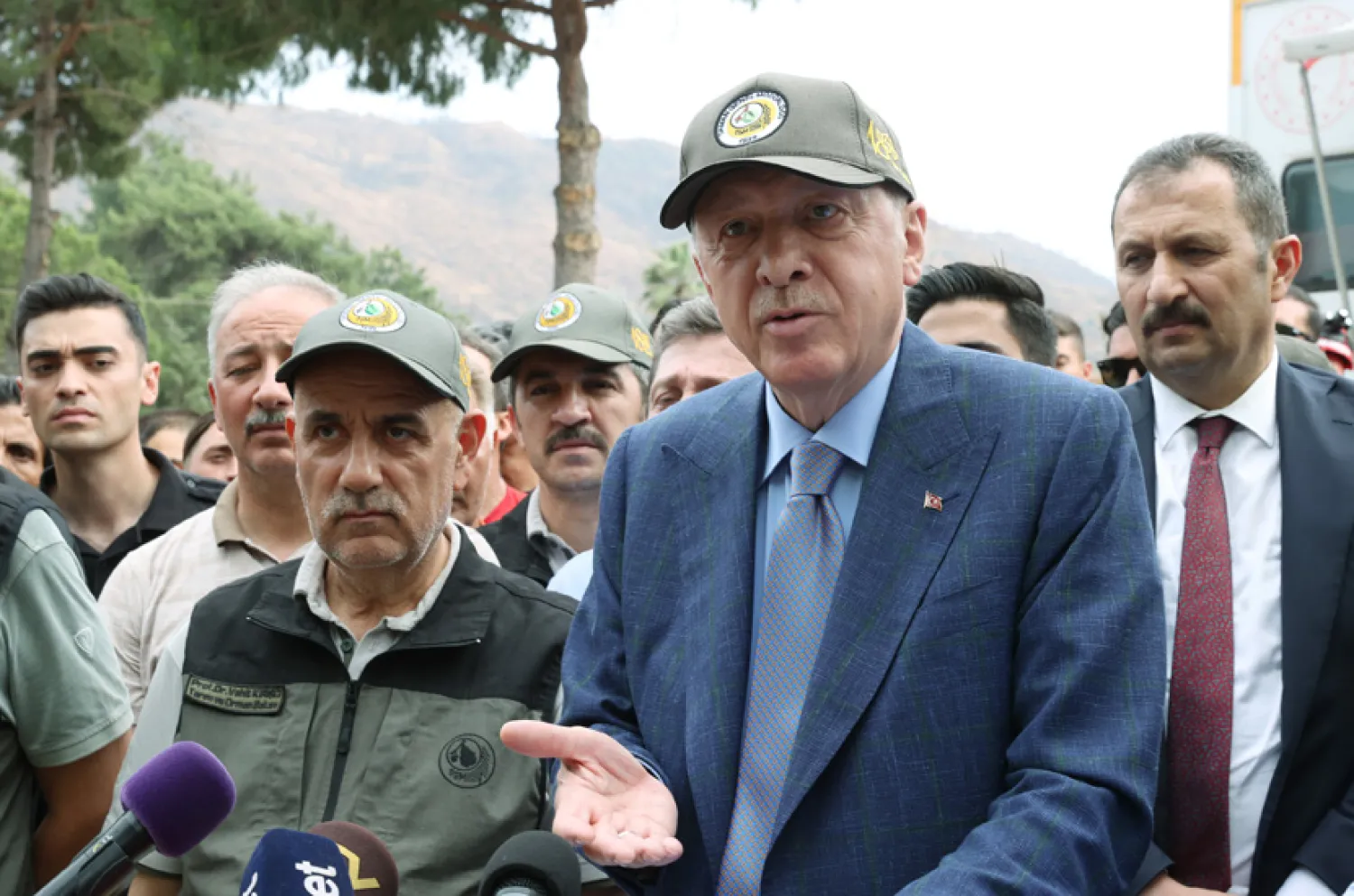 24 June 2022, Turkey, Marmaris: Turkish President Recep Tayyip Erdogan speaks with the media representatives during his visit to the fire fighting coordination center in Marmaris. (Turkish Presidency/dpa)