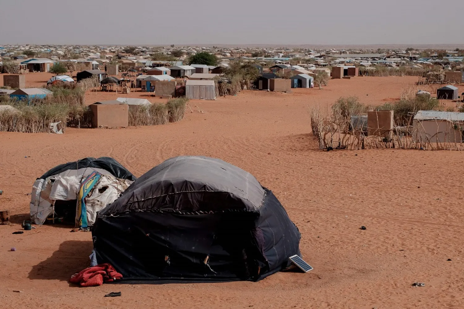 A general view of M'Berra camp in Bassikounou on June 7, 2022. - M'Berra camp, in South East Mauritania, is one the largest camps in West Africa hosting refugees, fleeing multifaceted violence in Mali's central Mopti and Timbuktu (north), violence allocated to extremist groups, Malian forces and the newly deployed elements of the Wagner Group. (AFP) 