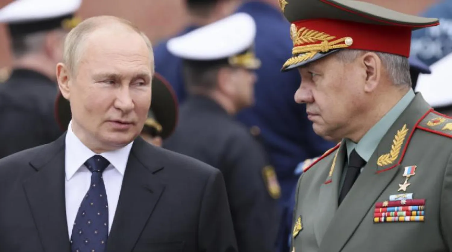 Rusya Devlet Başkanı Vladimir Putin ve Savunma Bakanı Sergey Şoygu (AP)
