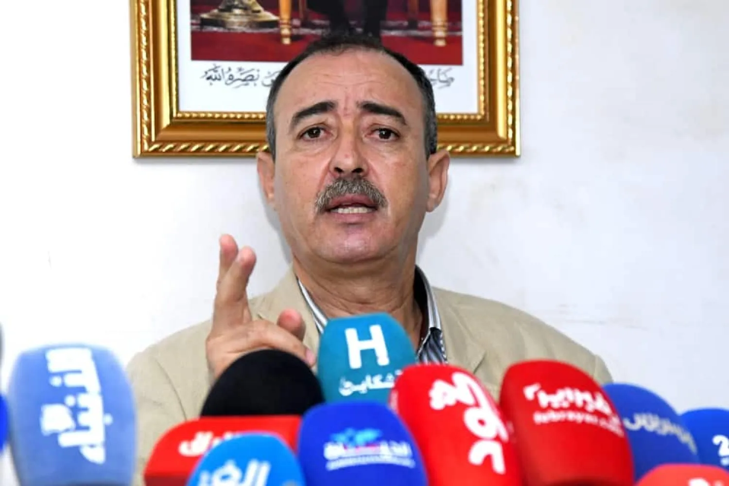Taher Saadoun, father of Moroccan Brahim Saadoun who was sentenced to death by a pro-Russian court in Ukraine, speaks at the press club in Morocco's capital Rabat. (AFP)