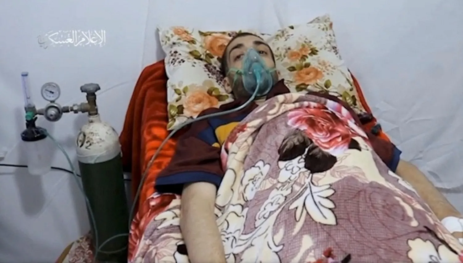 A still image taken from a video released by Hamas media office shows what Hamas military wing says is captured Israeli Hisham al-Sayyed in an undisclosed location. (Hamas Media Office/Handout via Reuters)