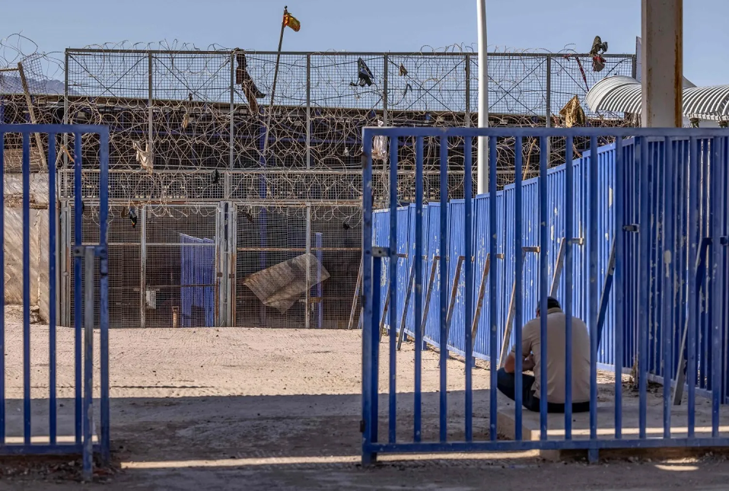 A picture taken on June 26, 2022, shows the border fence separating Morocco from Spain's North African Melilla enclave, near Nador in Morocco. (AFP)