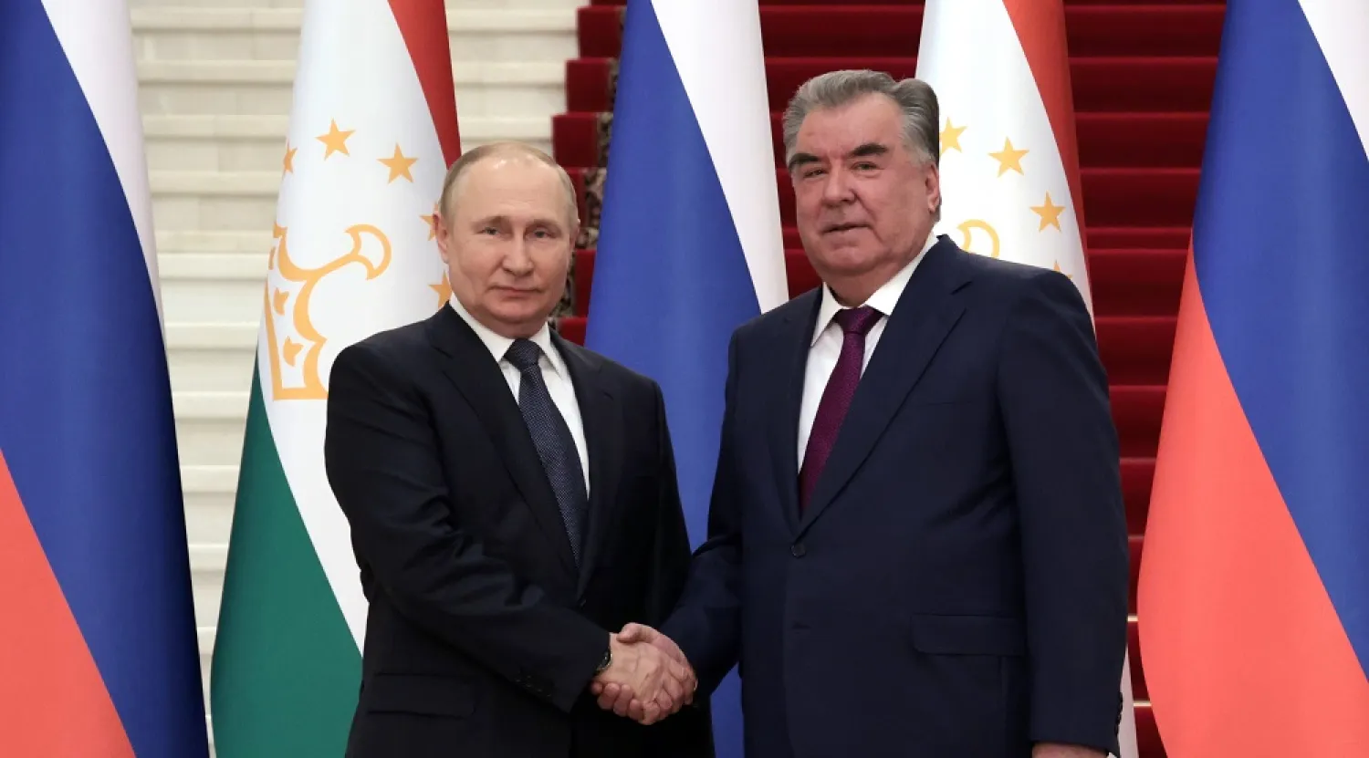 Russian President Vladimir Putin, left, and Tajikistan's President Emomali Rakhmon pose for a photo during their meeting in Dushanbe, Tajikistan, Tuesday, June 28, 2022. (Sputnik, Kremlin Pool Photo via AP) 