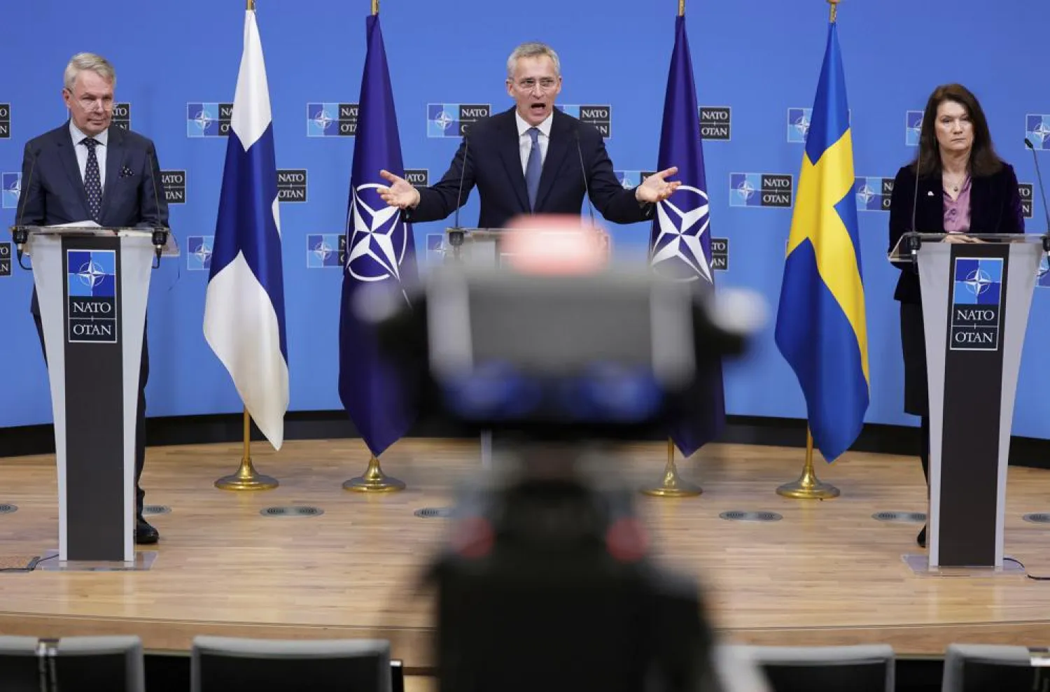 FILE - NATO Secretary General Jens Stoltenberg, center, participates in a media conference with Finland's Foreign Minister Pekka Haavisto, left, and Sweden's Foreign Minister Ann Linde, right, at NATO headquarters in Brussels, Jan. 24, 2022. (AP Photo/Olivier Matthys, File)
